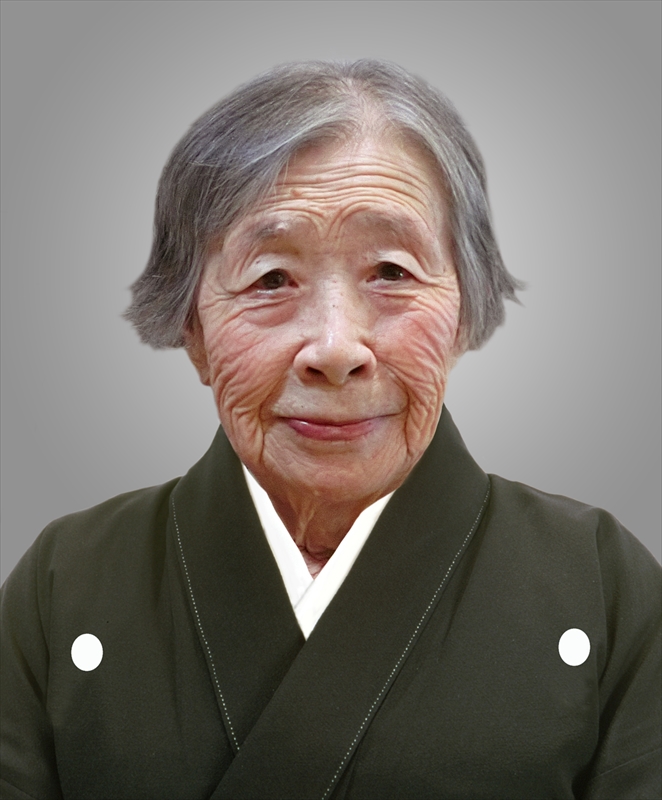 修正後